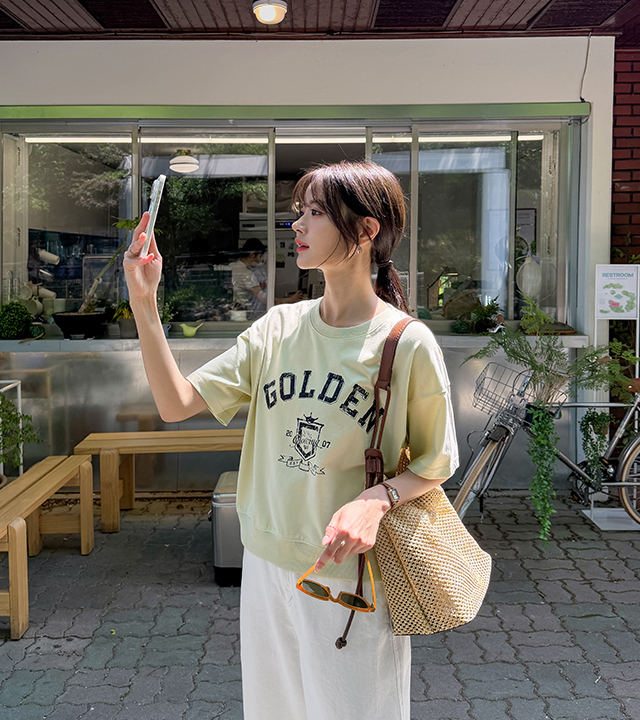 ゴールデンプリント半袖マンツーマンティー